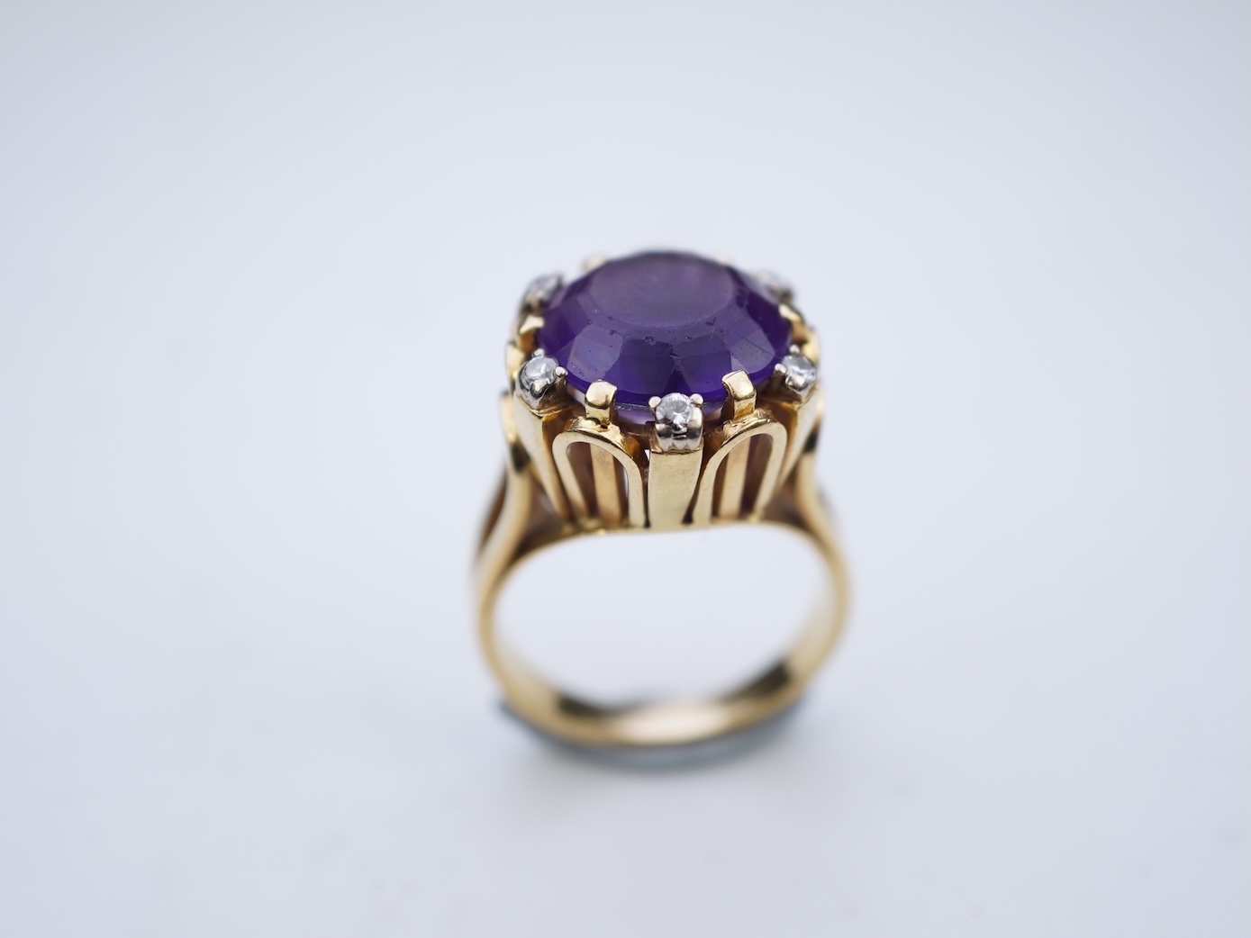 A stylish amethyst and diamond ring